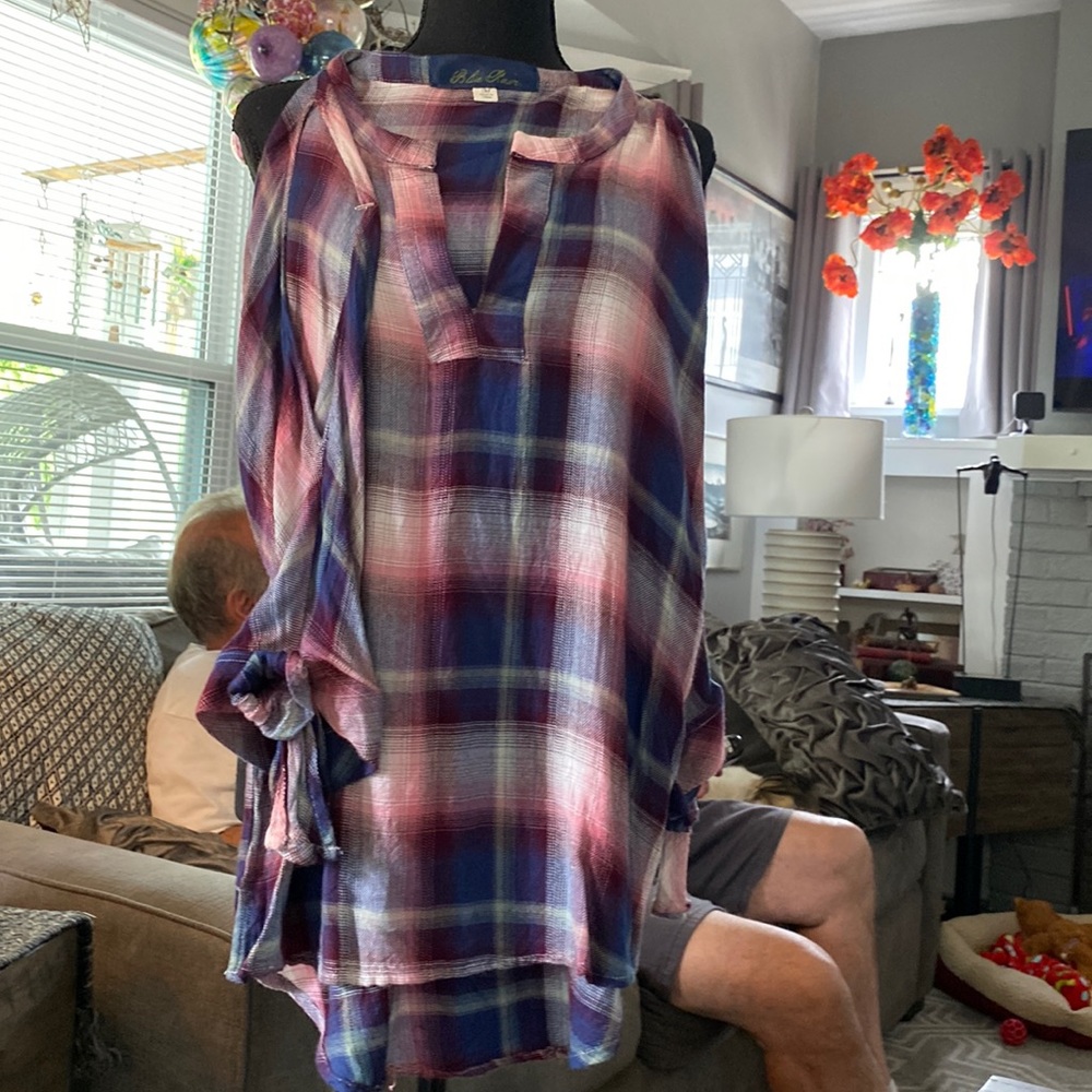 Blue rare size medium open down the arm on each side